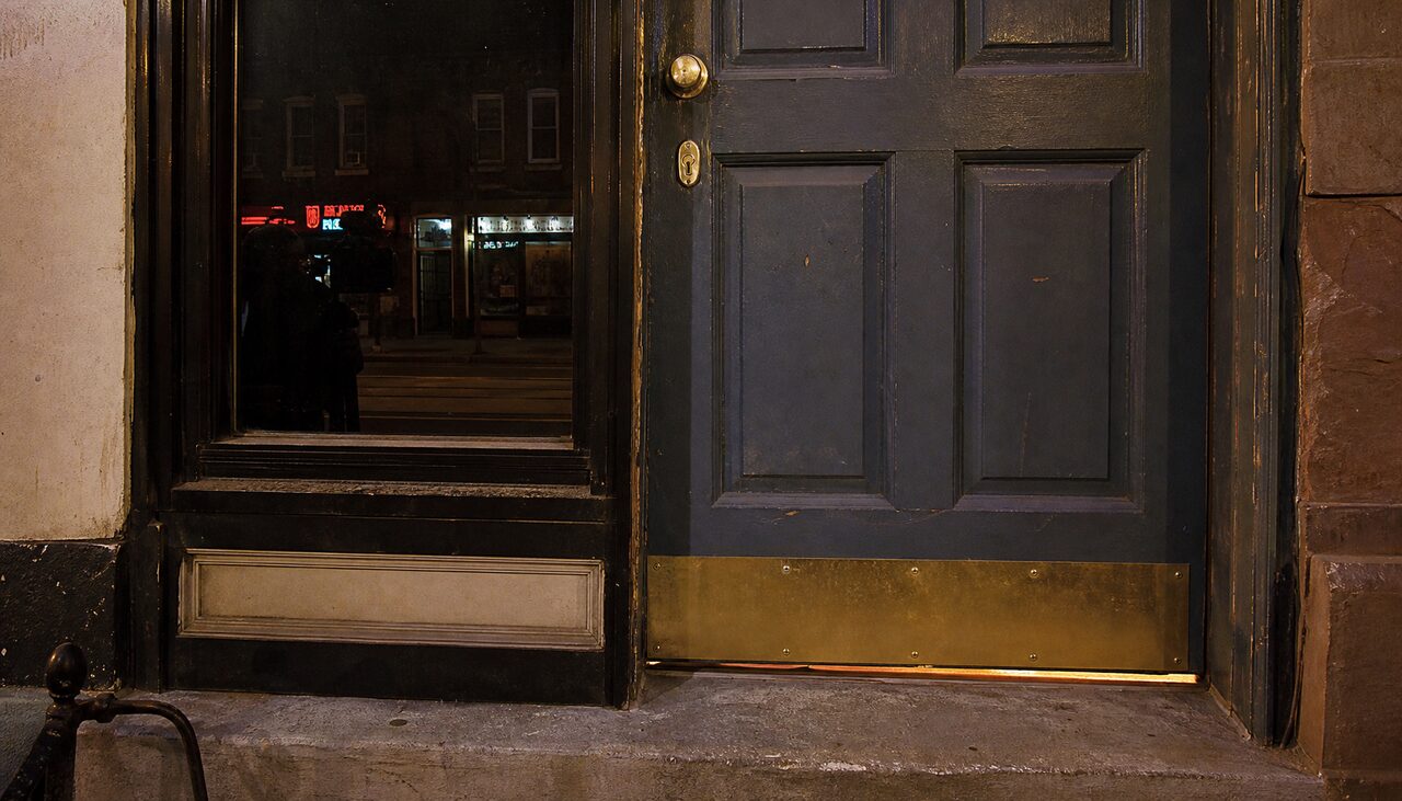 A closed door on a Philadelphia row house. The answer is, reportedly, on the other side of it.